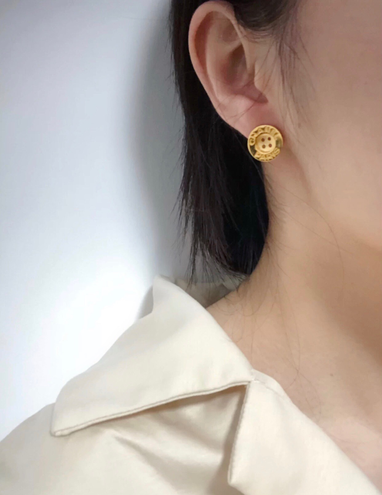 A1269  Chanel button earrings