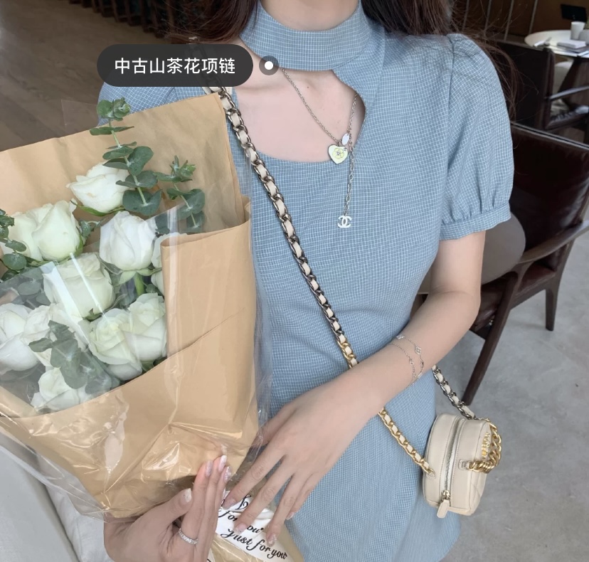 X500 Chanel camellia necklace