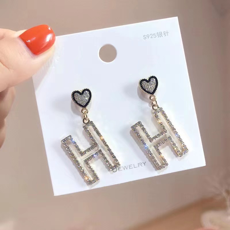 Hermes H heart earrings