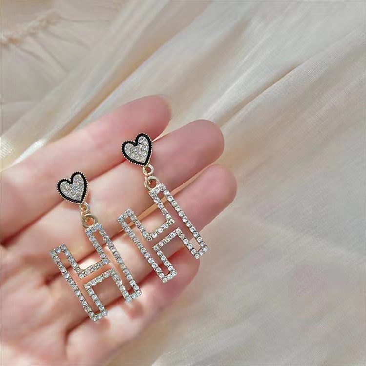 Hermes H heart earrings