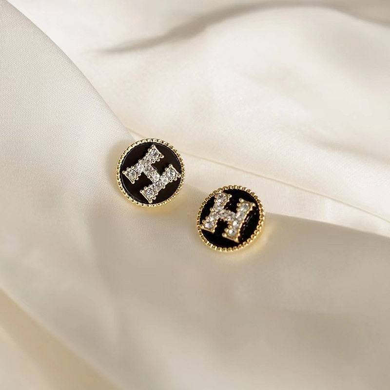 Hermes H circle crystal earrings