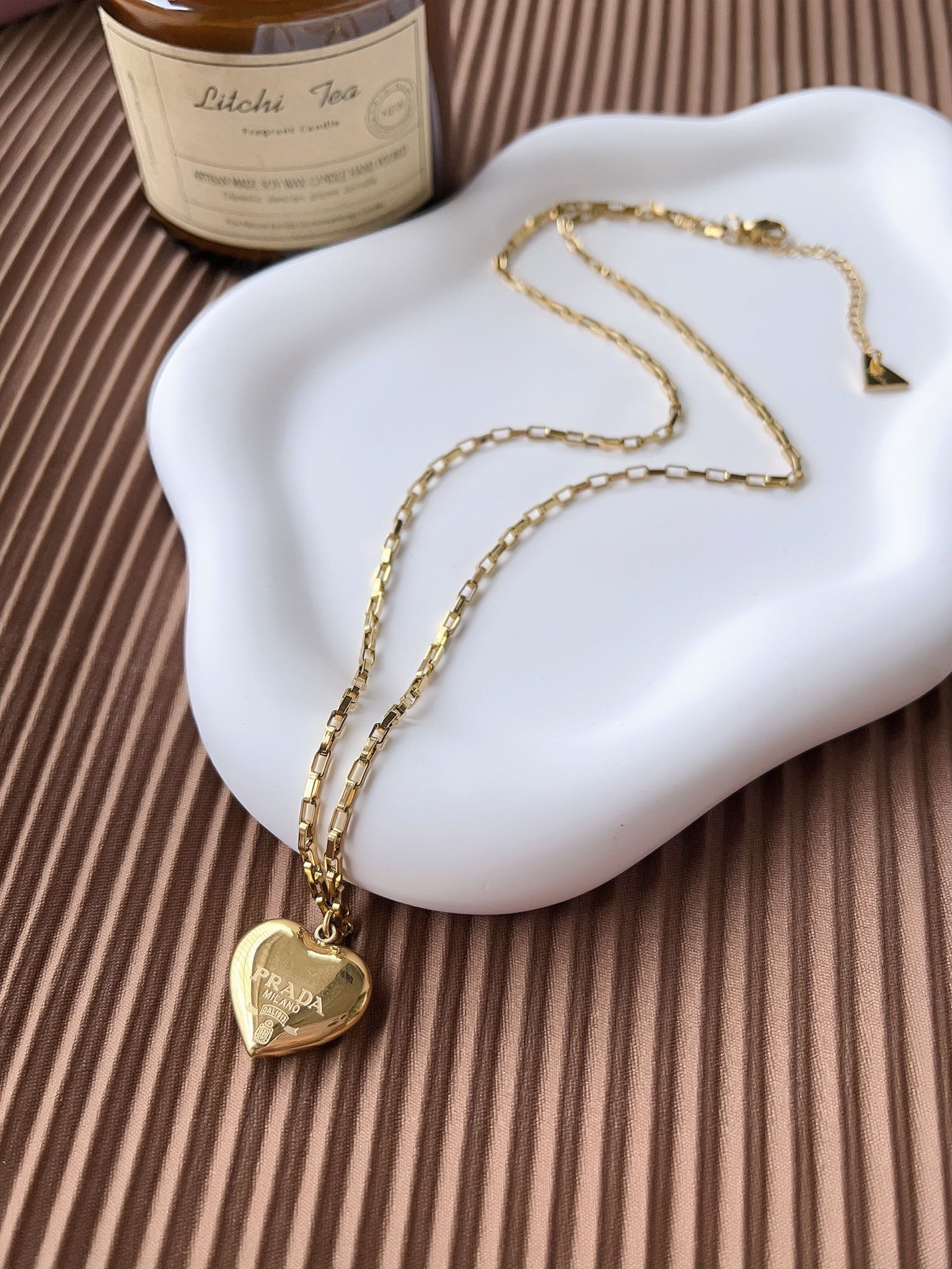 X607 Prada gold heart necklace