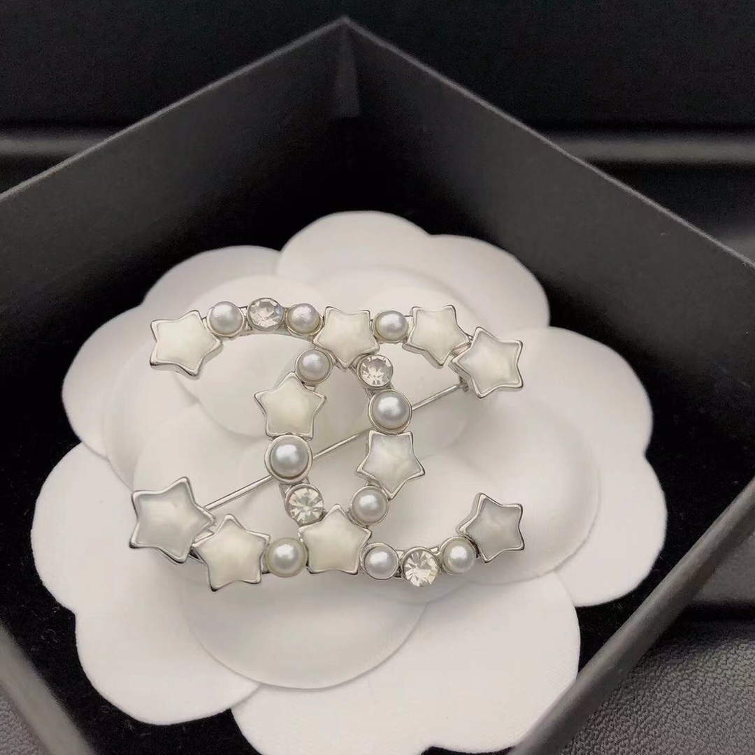 Chanel star brooch 115050