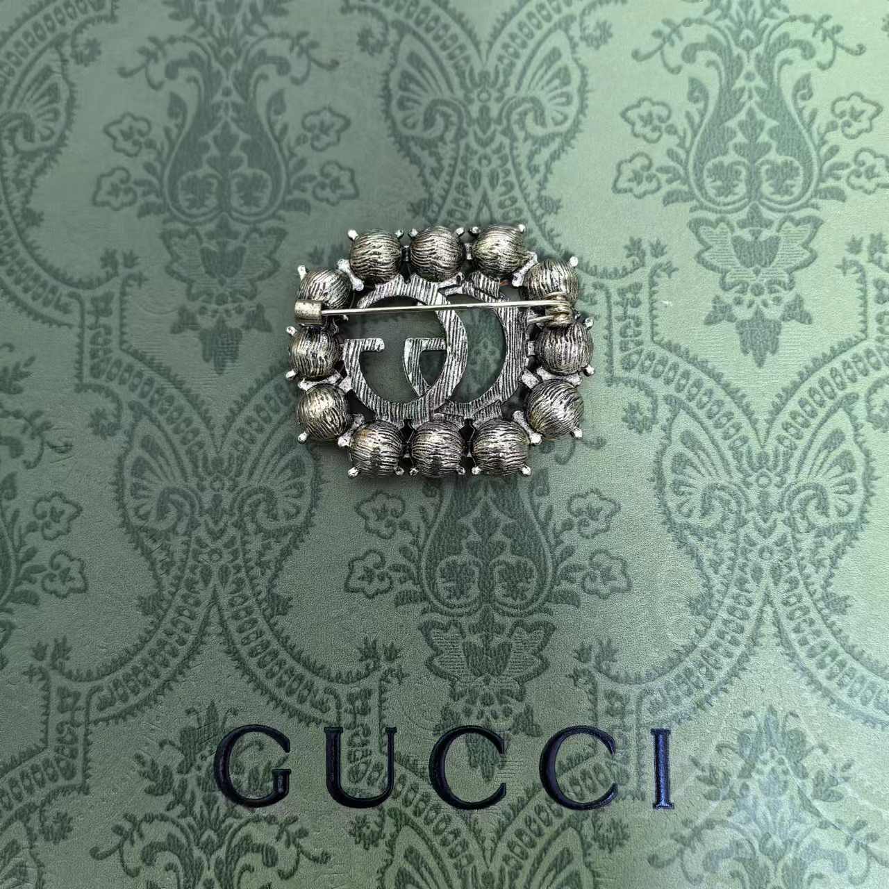 Gucci GG brooch